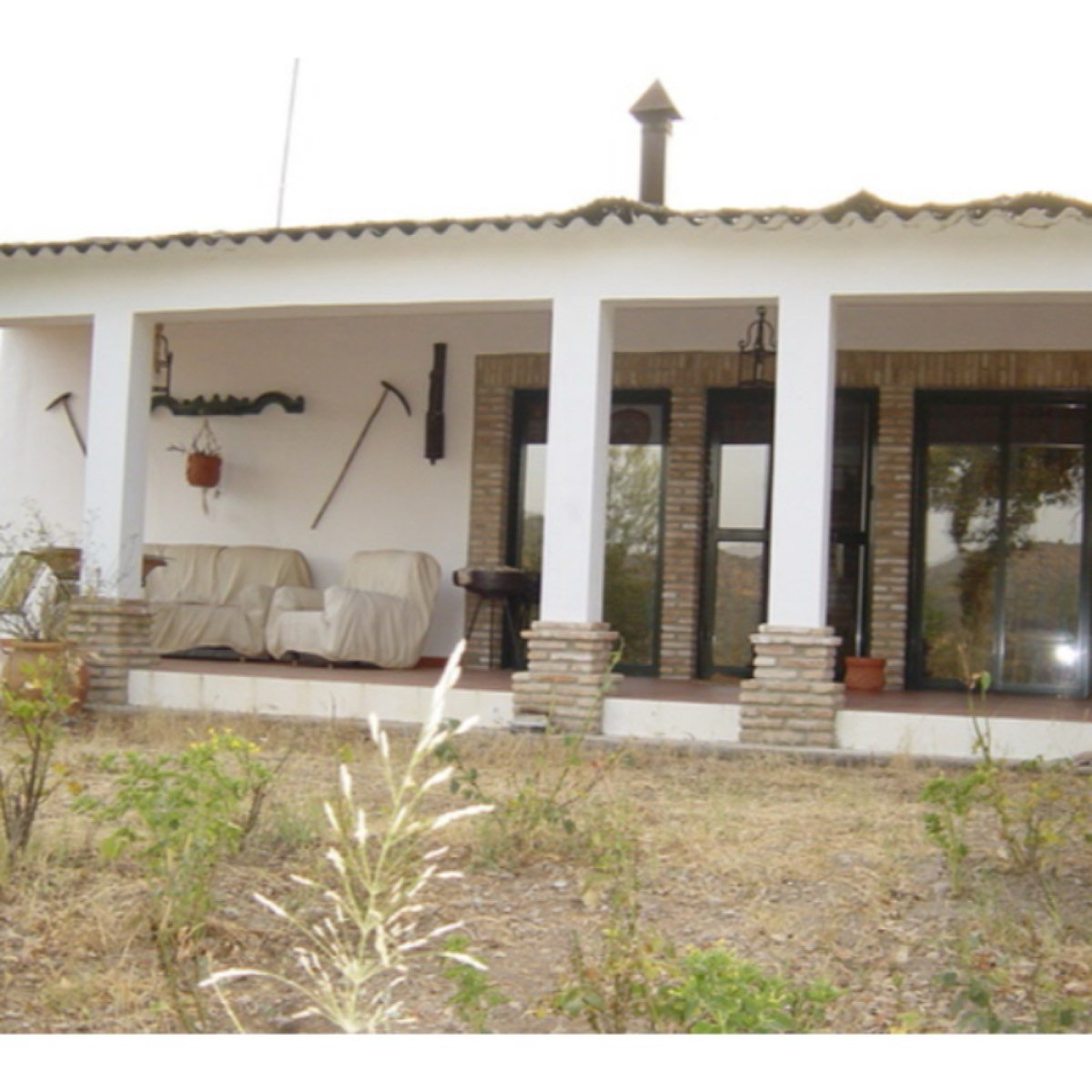CORTIJO EL TÍTULO