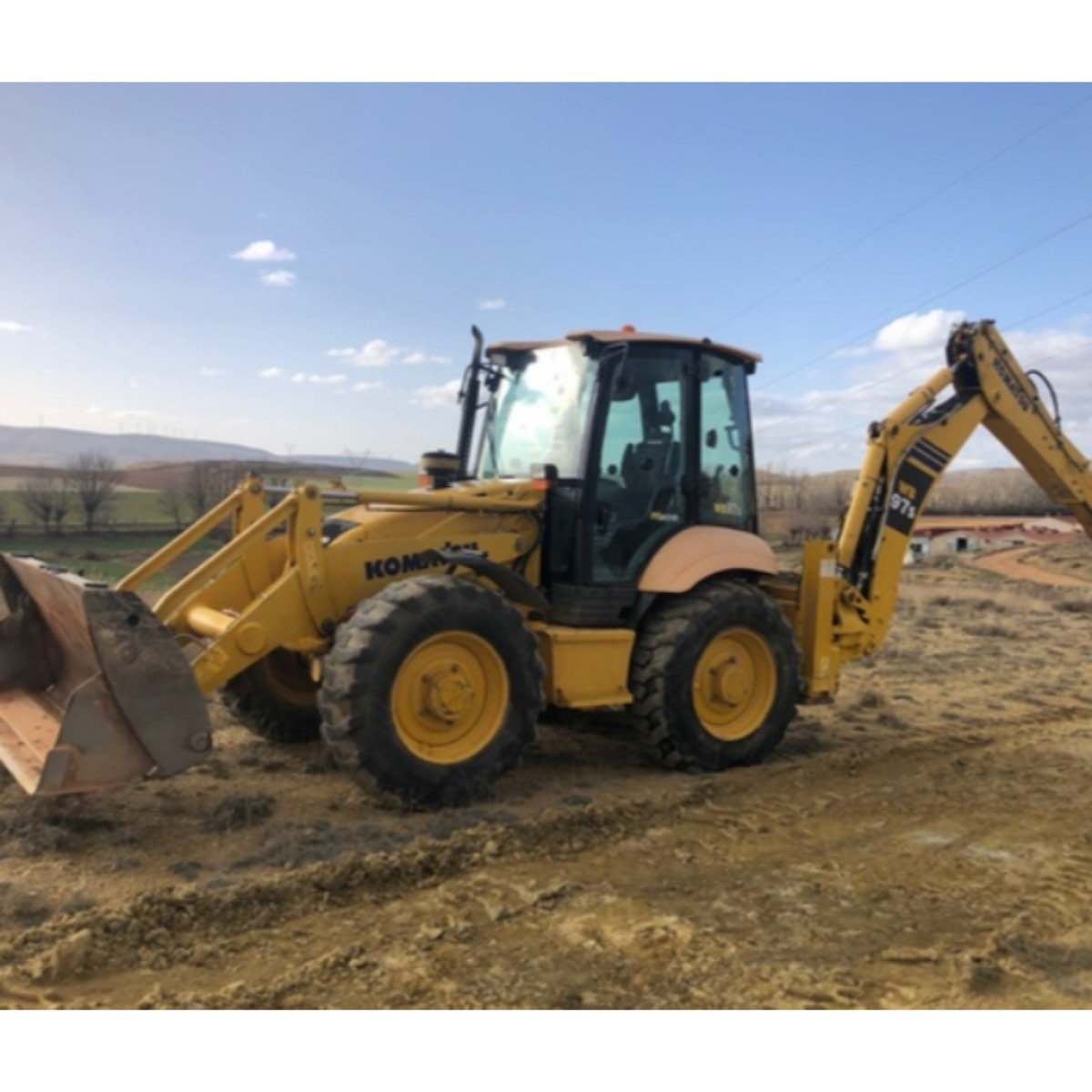 RETRO EXCAVADORA MIXTA KOMATSU